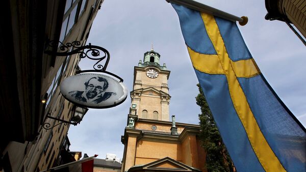 Bandeira da Suécia perto da Catedral de Estocolmo - Sputnik Brasil