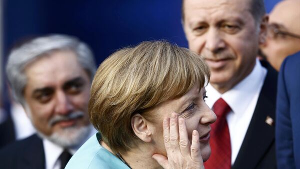 Bundeskanzlerin Angela Merkel und der türkische Präsident Recep Tayyip Erdogan - Sputnik Brasil