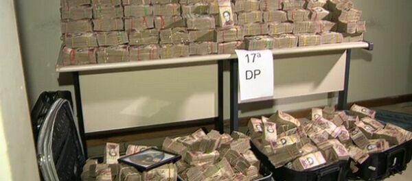 Os R$ 12 milhões estavam escondidos em malas dentro de dois carros na favela do Caju, na Zona Norte do Rio - Sputnik Brasil