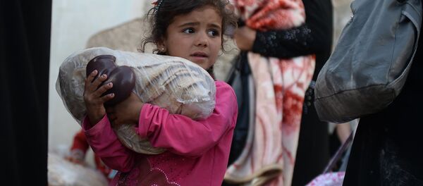 Distribuição de ajuda humanitária da Rússia à população da Síria - Sputnik Brasil