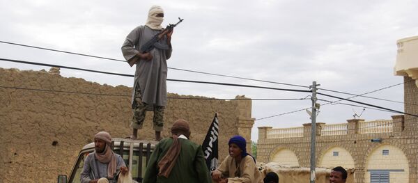 Fighters from the al-Qaida-linked Islamist group stand guard in Timbuktu, Mali (File) - Sputnik Brasil