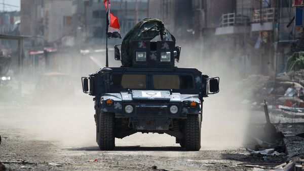 Veículo militar da Polícia Federal iraquiana em Mossul, 24 de março de 2017 - Sputnik Brasil