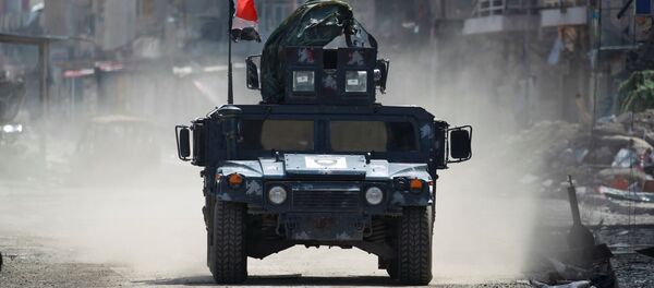 Veículo militar da Polícia Federal iraquiana em Mossul, 24 de março de 2017 - Sputnik Brasil
