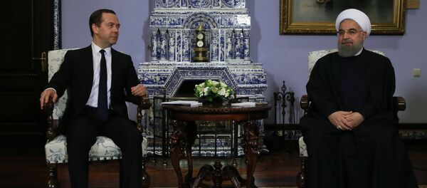 March 27, 2017. Russian Prime Minister Dmitry Medvedev meets with President of Iran Hassan Rouhani, right, on his official visit to Russia - Sputnik Brasil