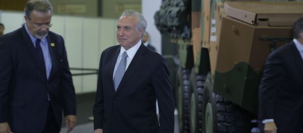 O presidente do Brasil, Michel Temer, e o ministro da Defesa, Raul Jungmann, na LAAD, maior feira de armamentos da América Latina, no Rio de Janeiro - Sputnik Brasil
