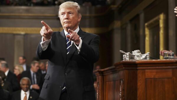 U.S. President Donald Trump reacts after delivering his first address to a joint session of Congress from the floor of the House of Representatives iin Washington, U.S., February 28, 2017 - Sputnik Brasil