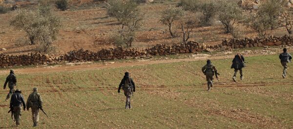 Free Syrian Army fighters are seen in al Baza'a village in the outskirts of al-Bab town, Syria - Sputnik Brasil