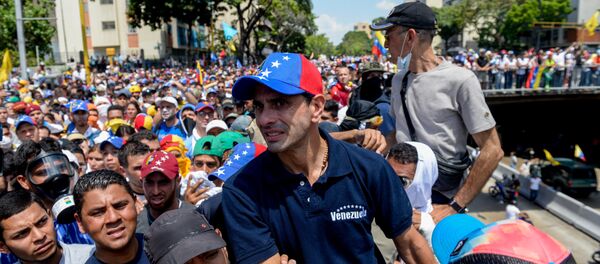 Líder opositor Henrique Capriles participa de protesto contra o presidente venezuelano Nicolás Maduro em Caracas - Sputnik Brasil
