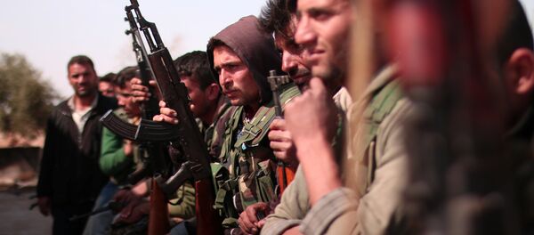 Combatentes das Forças Democráticas da Síria (FDS) ao norte da cidade de Raqqa, em 8 de março de 2017 - Sputnik Brasil