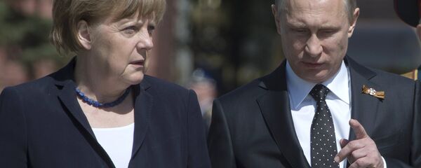 A chanceler alemã Angela Merkel e o presidente da Rússia Vladimir Putin - Sputnik Brasil