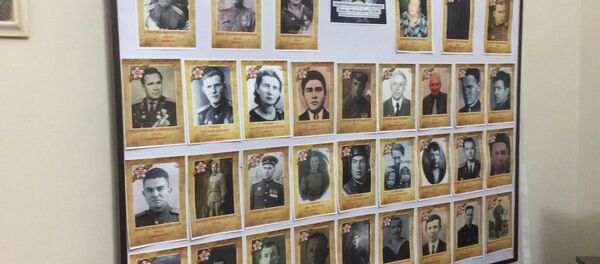 Painel montado pelo Consulado Geral da Rússia em homenagem aos combatentes mortos na Segunda Guerra Mundial - Sputnik Brasil