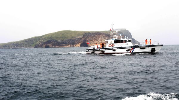 A Guarda Costeira de Taiwan faz patrulha durante a visita do presidente taiwanês Ma Ying-jeou à ilha Pengjia no Mar da China Oriental, no norte de Taiwan, no sábado, 9 de abril de 2016. - Sputnik Brasil