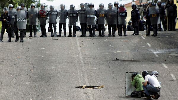 Protestos antigovernamentais em Venezuela - Sputnik Brasil
