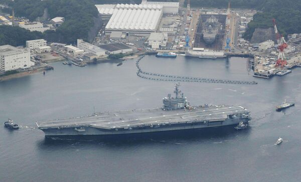 USS Ronald Reagan da Marinha dos EUA zarpa da base de Yokosuka, 16 de maio de 2017 - Sputnik Brasil