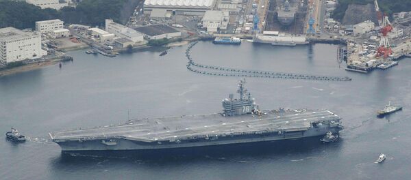 USS Ronald Reagan da Marinha dos EUA zarpa da base de Yokosuka, 16 de maio de 2017 - Sputnik Brasil