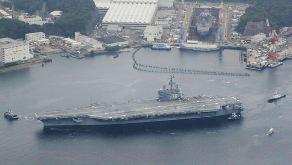 USS Ronald Reagan da Marinha dos EUA zarpa da base de Yokosuka, 16 de maio de 2017 - Sputnik Brasil