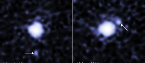 O maior planeta anão 2007 OR10, localizado na região chamada de Cinturão de Kuiper, é acompanhado por uma pequena lua - Sputnik Brasil