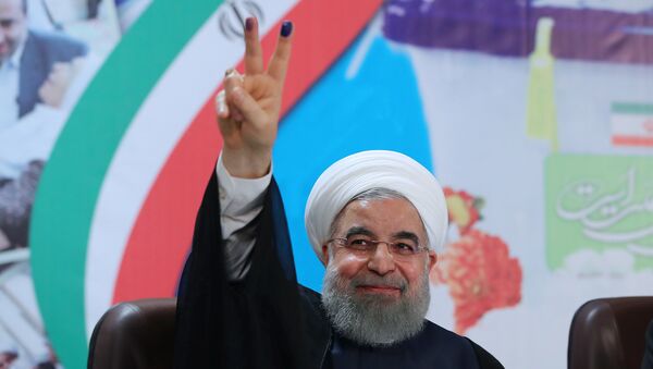 Iran's President Hassan Rouhani gestures as he registers to run for a second four-year term in the May election, in Tehran, Iran, April 14, 2017. - Sputnik Brasil