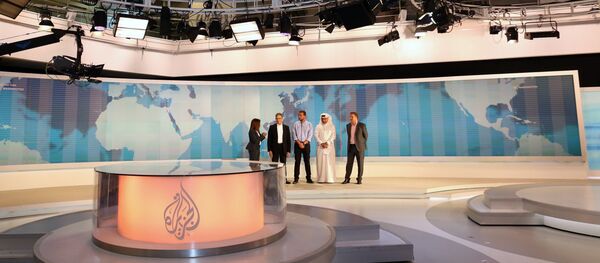 Al-Jazeera channel's newsroom in Doha Al-Jazeera channel's newsroom in Doha - Sputnik Brasil