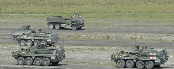 Lançadores múltiplos de foguetes HIMARS dos EUA Lançadores múltiplos de foguetes HIMARS dos EUA - Sputnik Brasil