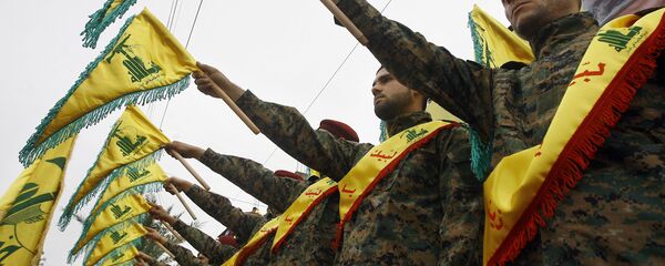Militantes do grupo xiita libanês Hezbollah - Sputnik Brasil