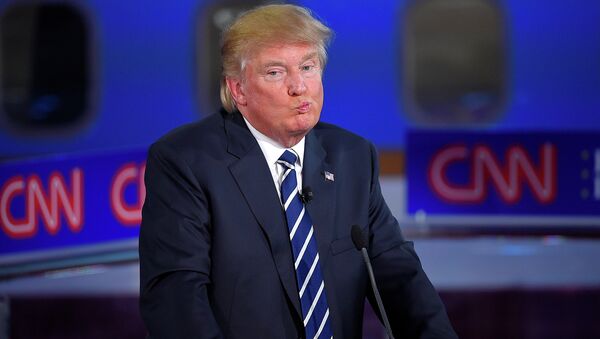 Republican presidential candidate, businessman Donald Trump reacts during the CNN Republican presidential debate. - Sputnik Brasil