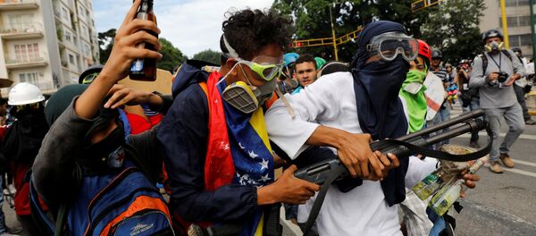 Protestos de oposição na venezuela, em 3 de maio de 2017 Protestos de oposição na venezuela, em 3 de maio de 2017 - Sputnik Brasil