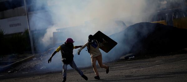 Protestas en Caracas, Venezuela - Sputnik Brasil