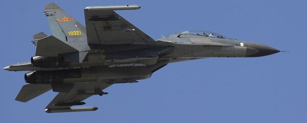 Caça chinês J-11 - Sputnik Brasil