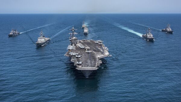 In this image released by the U.S. Navy, the aircraft carrier USS Carl Vinson, flanked by South Korean destroyers, from left, Yang Manchun and Sejong the Great, and the U.S.Navy's Wayne E. Meyer and USS Michael Murphy, transit the western Pacific Ocean Wednesday, May 3, 2017. - Sputnik Brasil