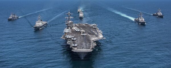 In this image released by the U.S. Navy, the aircraft carrier USS Carl Vinson, flanked by South Korean destroyers, from left, Yang Manchun and Sejong the Great, and the U.S.Navy's Wayne E. Meyer and USS Michael Murphy, transit the western Pacific Ocean Wednesday, May 3, 2017. - Sputnik Brasil
