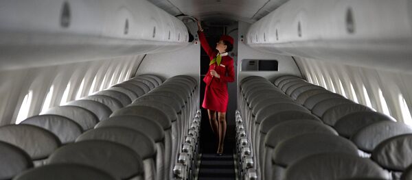Aeromoça (foto de arquivo) - Sputnik Brasil