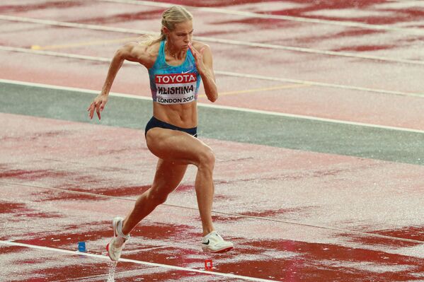 A atleta russa Daria Klishina durante as eliminatórias no salto a distância no Mundial de Atletismo 2017 em Londres - Sputnik Brasil