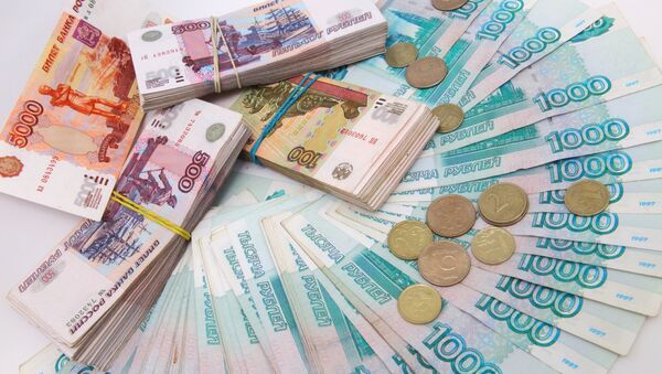 Russian ruble banknotes of different denominations - Sputnik Brasil