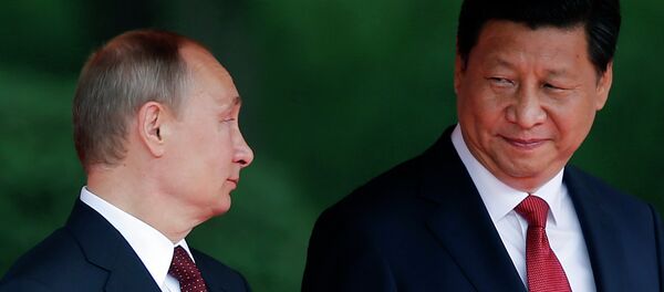 Presidente da Rússia, Vladimir Putin, e presidente da China, Xi Jinping, em maio de 2014 - Sputnik Brasil