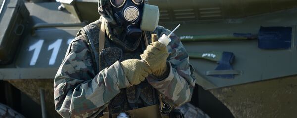 Militar russo em máscara de gás durante exercícios táticos na república de Inguchétia (Rússia) Militar russo em máscara de gás durante exercícios táticos na república de Inguchétia (Rússia) - Sputnik Brasil