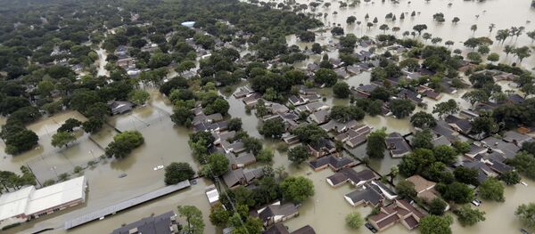 A neighborhood near Addicks Reservoir are flooded by rain from Tropical Storm Harvey Tuesday, Aug. 29, 2017, in Houston. - Sputnik Brasil