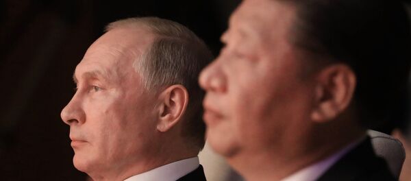 Presidente russo, Vladimir Putin, com seu homólogo chinês, Xi Jinping, assiste concerto em Xiamen, China, 3 de setembro de 2017 - Sputnik Brasil