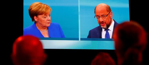 Jornalistas em Berlim acompanham debate entre Merkel e Schulz - Sputnik Brasil