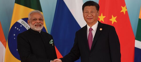 O líder chinês, Xi Jinping, e o primeiro-ministro indiano, Narendra Modi. O líder chinês, Xi Jinping, e o primeiro-ministro indiano, Narendra Modi. - Sputnik Brasil