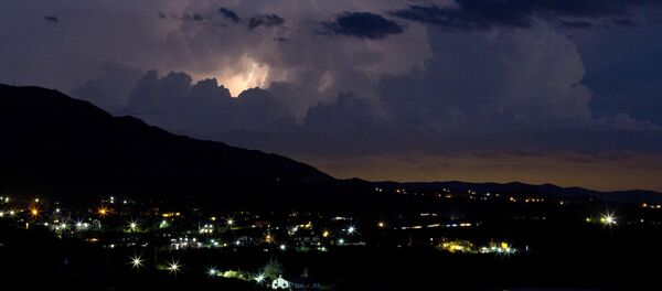 In this Feb. 12, 2016 photo, lightening strikes near the town of Capilla del Monte, Cordoba, Argentina - Sputnik Brasil