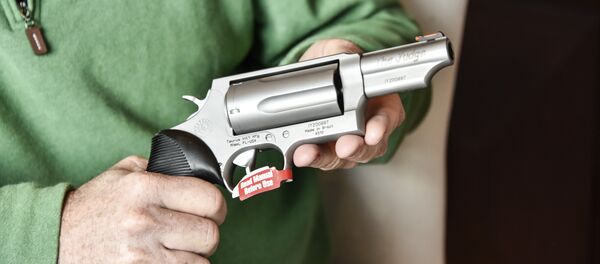 Imagem de um revólver Taurus, de fabricação brasileira - Sputnik Brasil