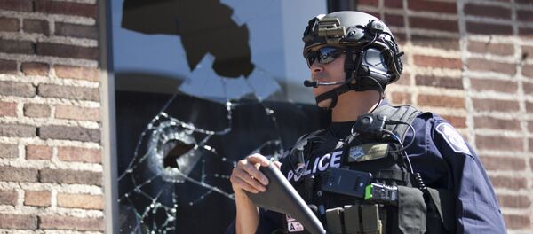 Policial norte-americano (foto de arquivo) - Sputnik Brasil