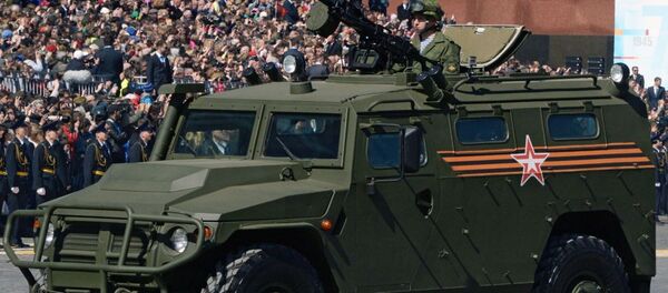 Carro blindado Tigr durante o ensaio geral da parada militar em homenagem ao 70º aniversário da vitória na Segunda Guerra Mundial de 1941-1945. - Sputnik Brasil