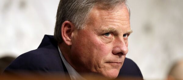 Senate Intelligence Committee Chairman Sen. Richard Burr, R-N.C. listens on Capitol Hill in Washington. Democratic lawmakers and rights groups criticized Burr on June 2, 2017, for seeking the return of copies of a report on CIA treatment of detainees after 9/11, saying he is trying to erase history - Sputnik Brasil