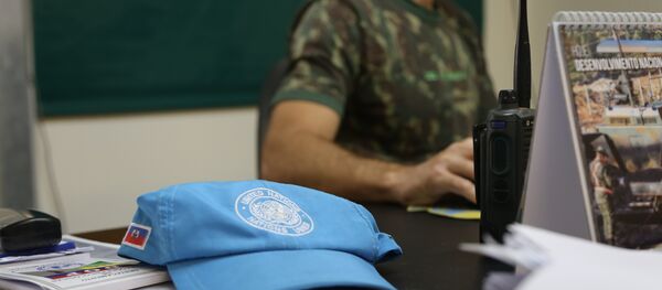 Boné de um pacificador das Nações Unidas no Haiti. Boné de um pacificador das Nações Unidas no Haiti. - Sputnik Brasil