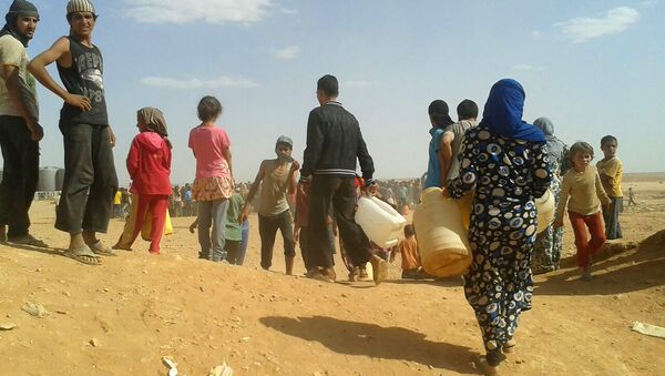 Refugiados sírios no acampamento de Rukban, na fronteira sírio-jordaniana (foto de arquivo) - Sputnik Brasil