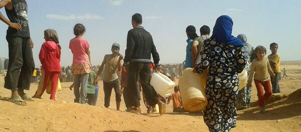 Refugiados sírios no acampamento de Rukban, na fronteira sírio-jordaniana (foto de arquivo) - Sputnik Brasil