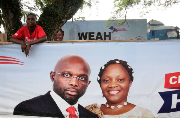 Pôster da campanha de George Weah. - Sputnik Brasil