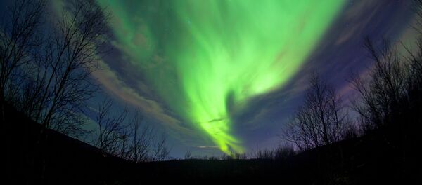 Aurora boreal no céu sobre Murmansk - Sputnik Brasil